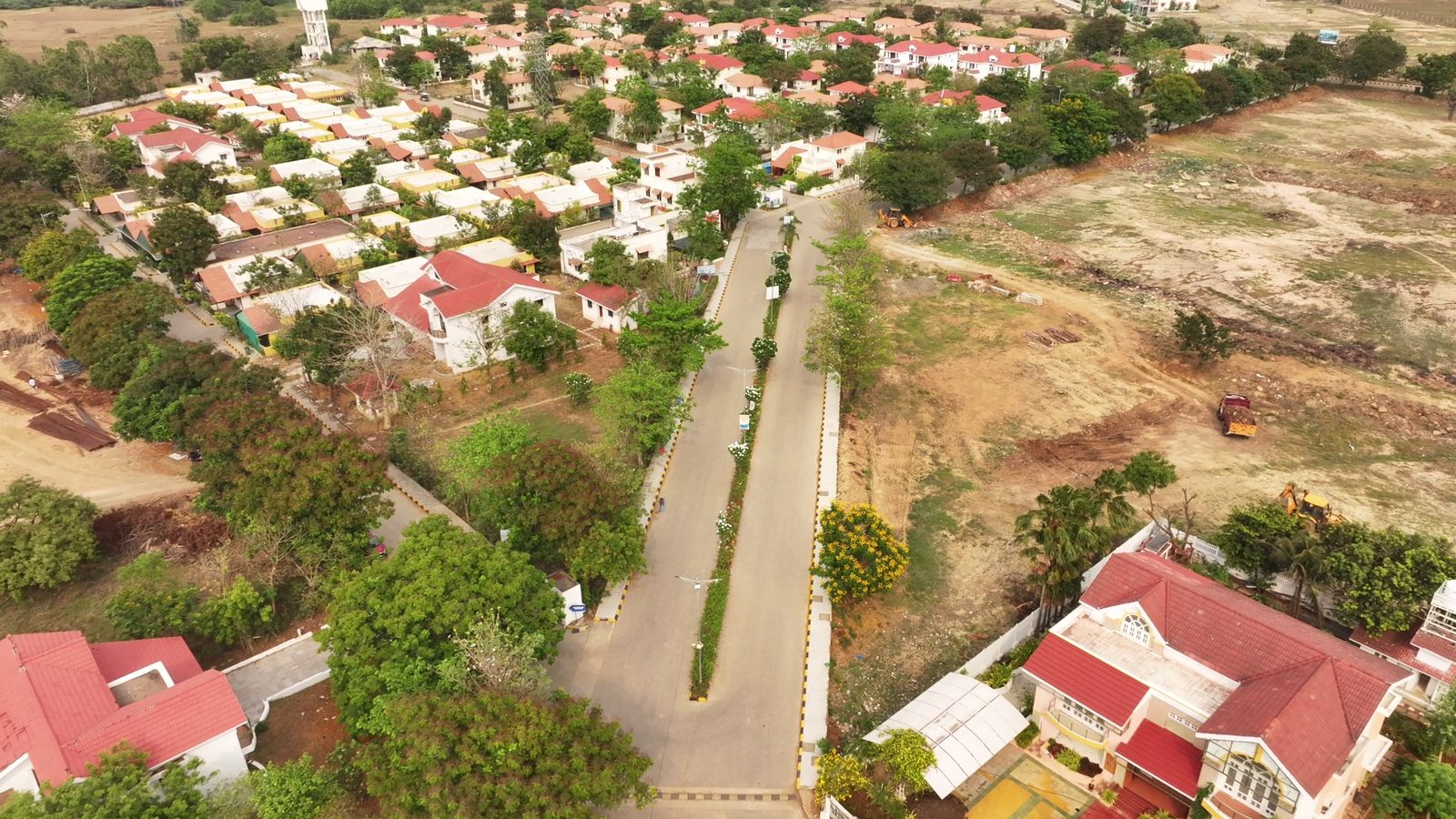 Houses already built on the earlier phase, beside open plots